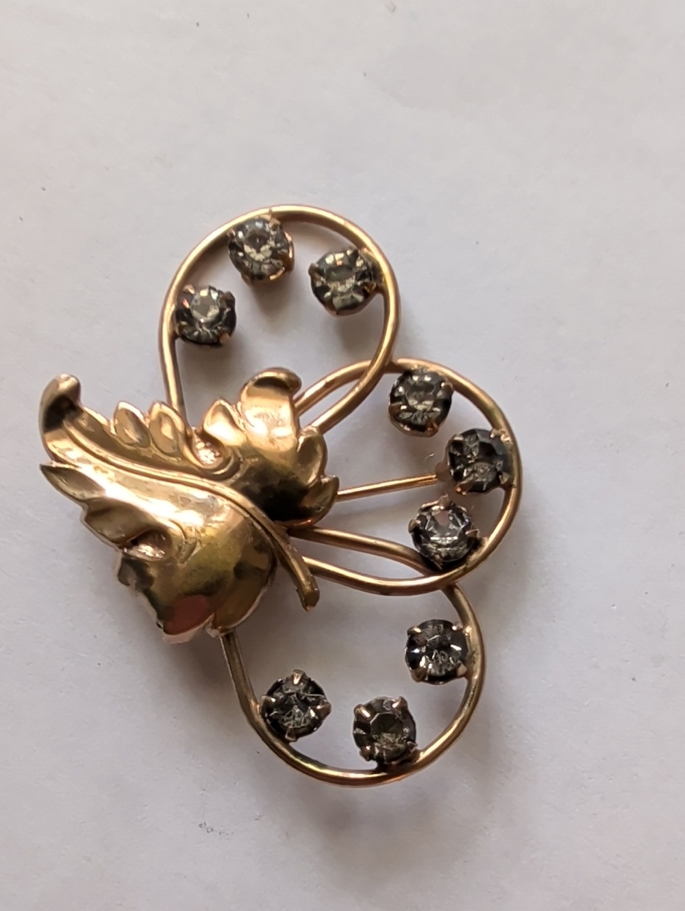 Vintage Gold Tone Leaf Brooch with Gray And Clear Rhinestones